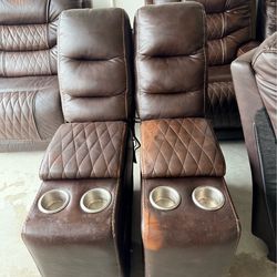 Brown leather section w/3 recliners seats 6 + 1 matching recliners outlets, USB ports & storage