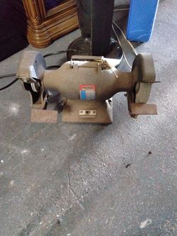 item is an industrial-grade double-end bench grinder