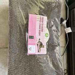 Kitty City Lounge Scratcher designed for cats to scratch and rest on. 