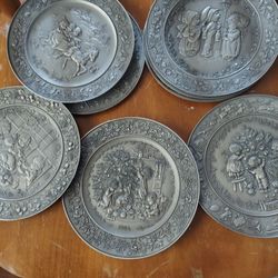 Beautiful Pewter Collectable Plates .