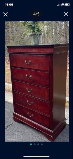 Modern solid wood tall chest. Drawers sliding smoothly