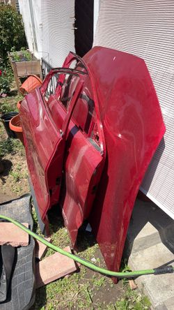 Mustang Mach e hood and both passenger side doors