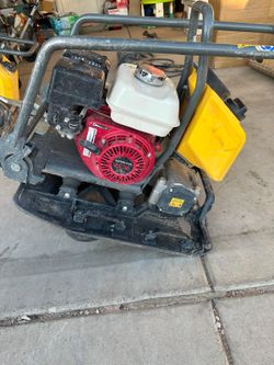 Hello plate compactor $60 per day  power broom $60 per day