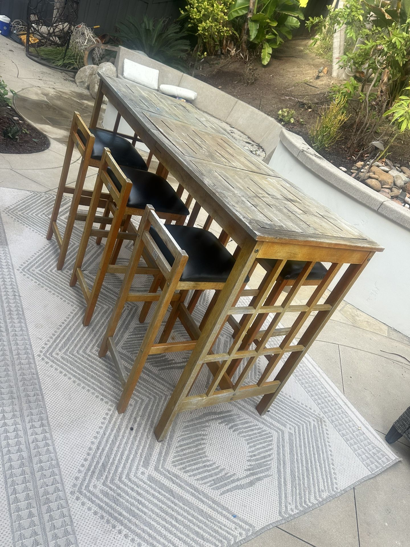 Patio Table, Stools And Rug