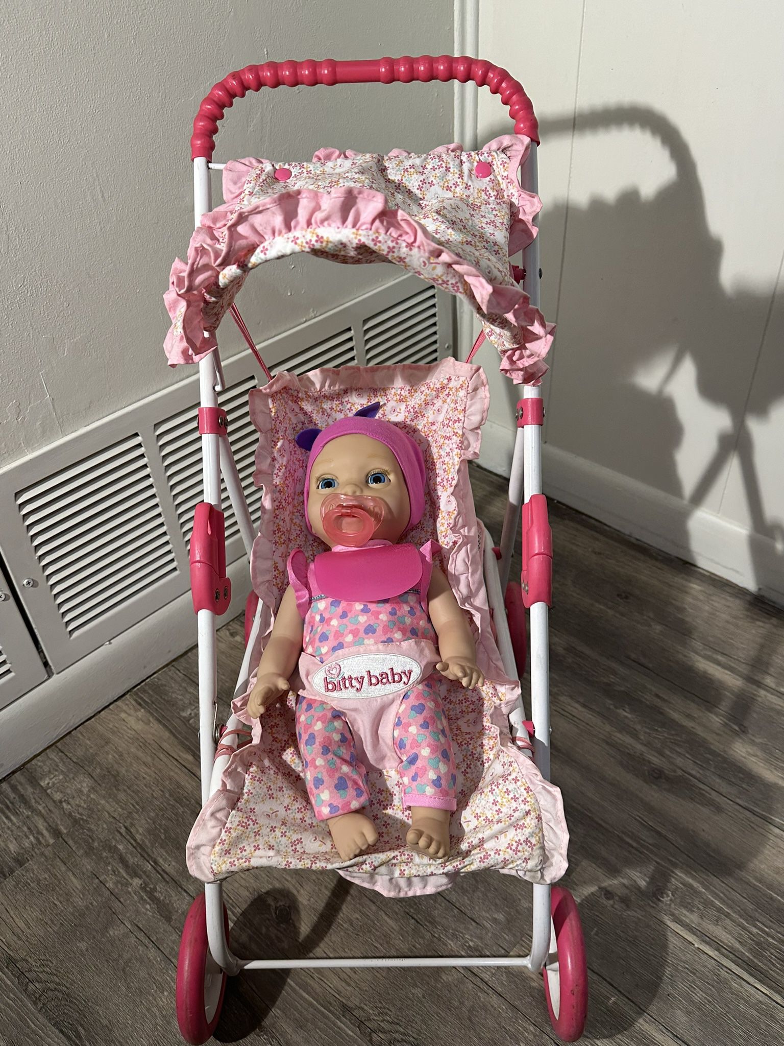 Bitty baby stroller and luvabella doll 