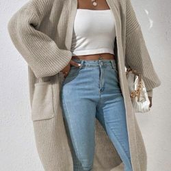 Oversized cream cardigan with pockets 