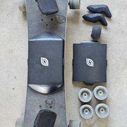 Electric summerboard skateboard longboard with extra battery extra wheels extra remote and foot paddings