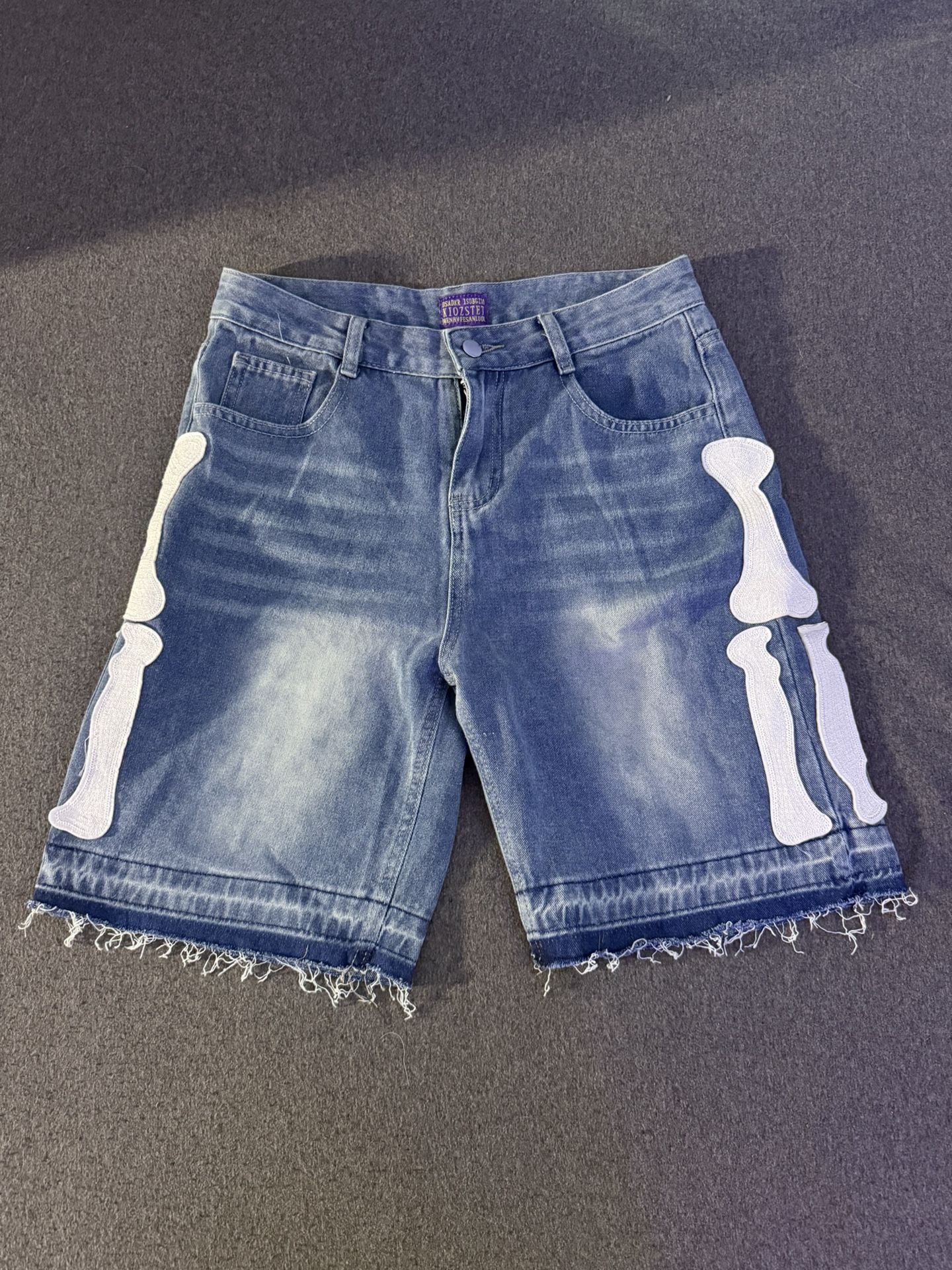 skeleton jean shorts