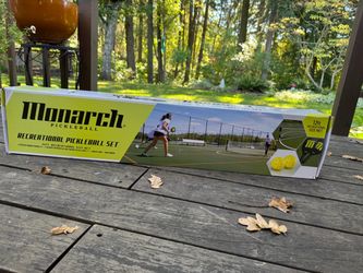 Brand new Pickleball set with paddles and net