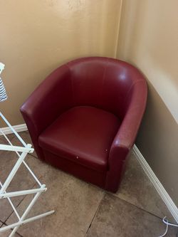 Red swivel lounge chair
