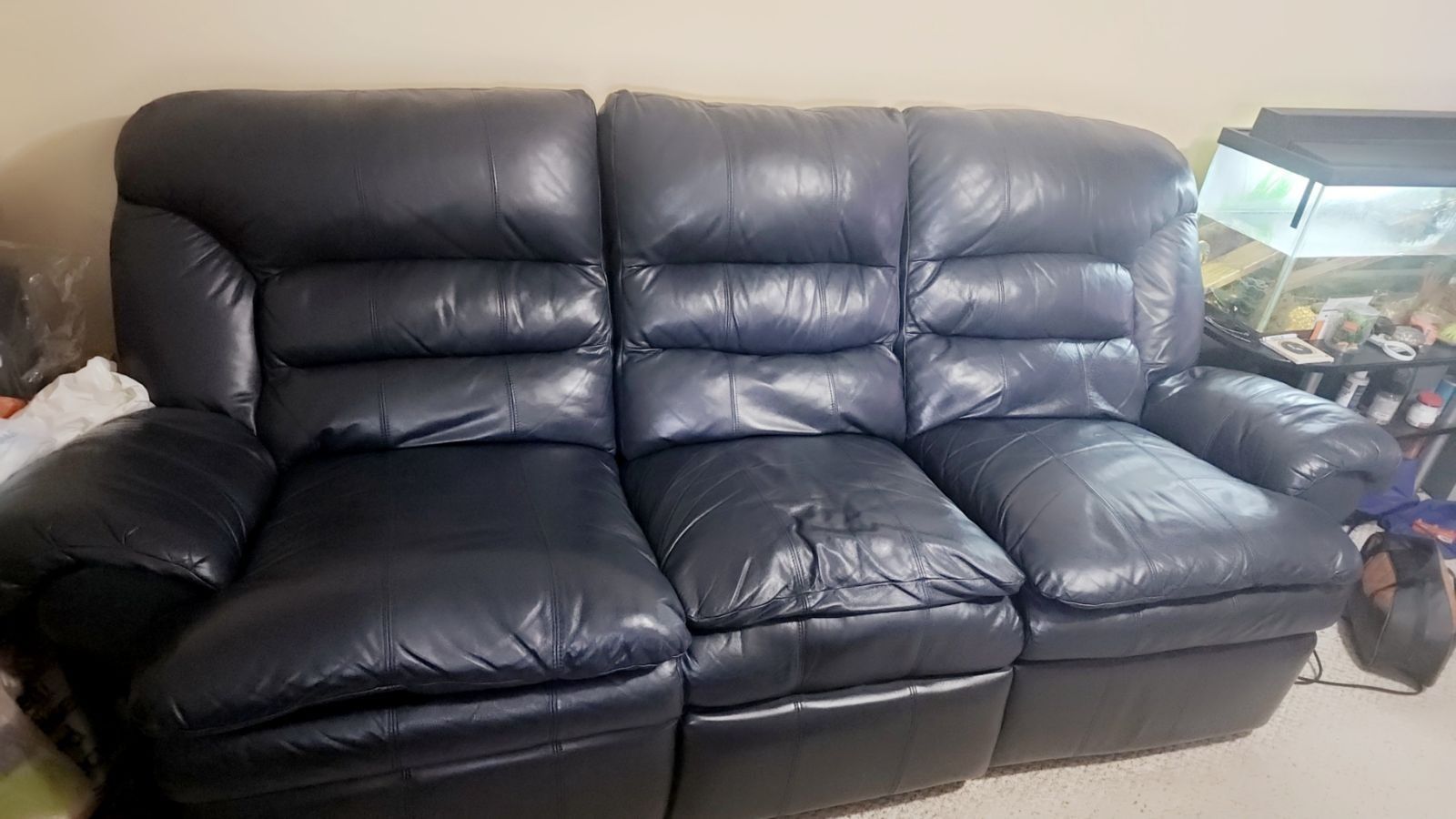 MUST GO. MAKE AN OFFER 2 piece genuine leather living room recliner couch and love seat. 