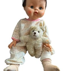 Doll vintage 18” play doll with her cute bear. She has little rosé pajamas they have wear on legs of pj and one little hole in pj please look at all p