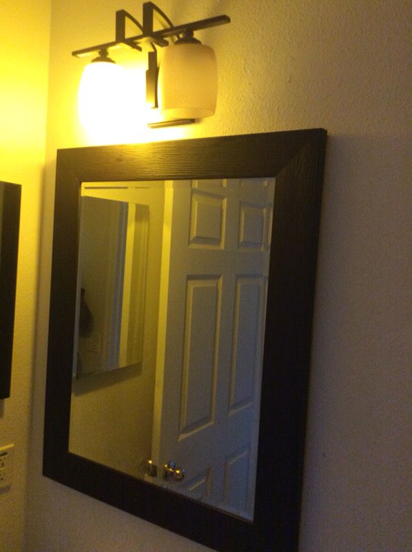 Large dark brown espresso mirror& light fixture from Home Depot only used for a couple weeks