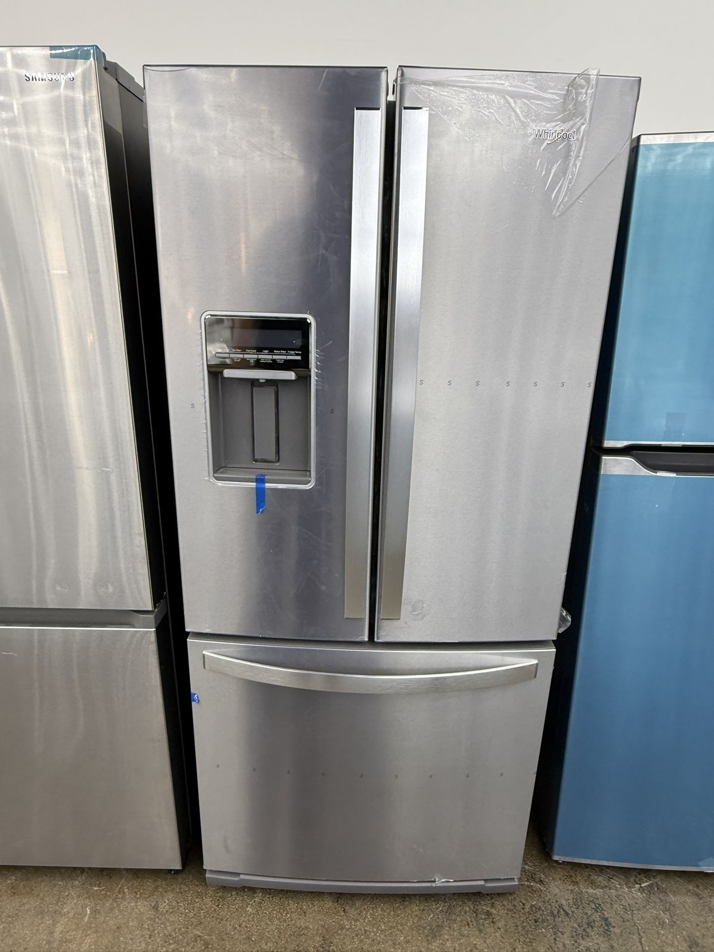 Brand new Whirlpool stainless steel French door ice and water dispenser refrigerator 30 inches
