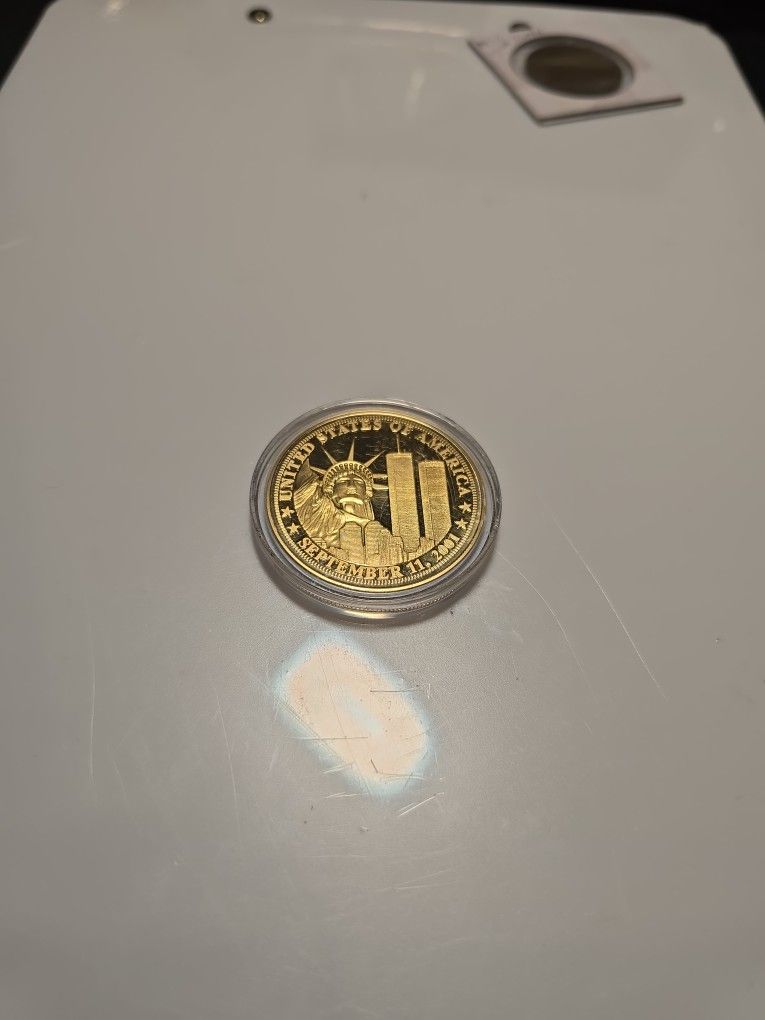 Gold Toned 911 Commerative Coin Encapsulated. Asking $20