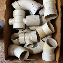 3 Boxes Of PVC Plumbing Pieces 