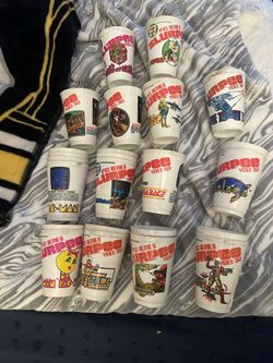 Vintage 711 Slurpee cups video games from the 80s