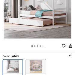 Twin House Bed with Trundle.