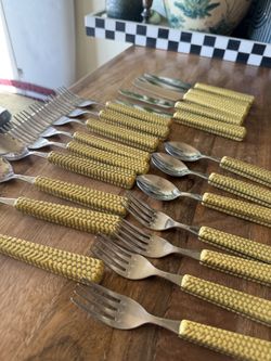 Vintage Bloomingdales safari tiki Yellow Textured Handle Cutlery Set 20 pieces  Stylish cutlery set with yellow textured handles. Includes forks, kniv