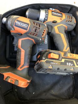 18 RIDGID IMPACT AND DRILL WITH BATTERY AND CHARGER