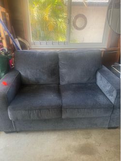 Dark grey loveseat