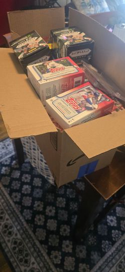 $100 worth of different sports cards