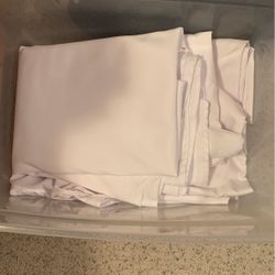 6 White Rectangular Table Clothes. 