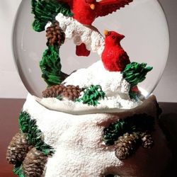 Christmas san francisco music box company cardinal bird snow globe plays music