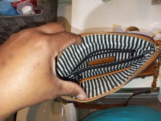 Brown and gold purse