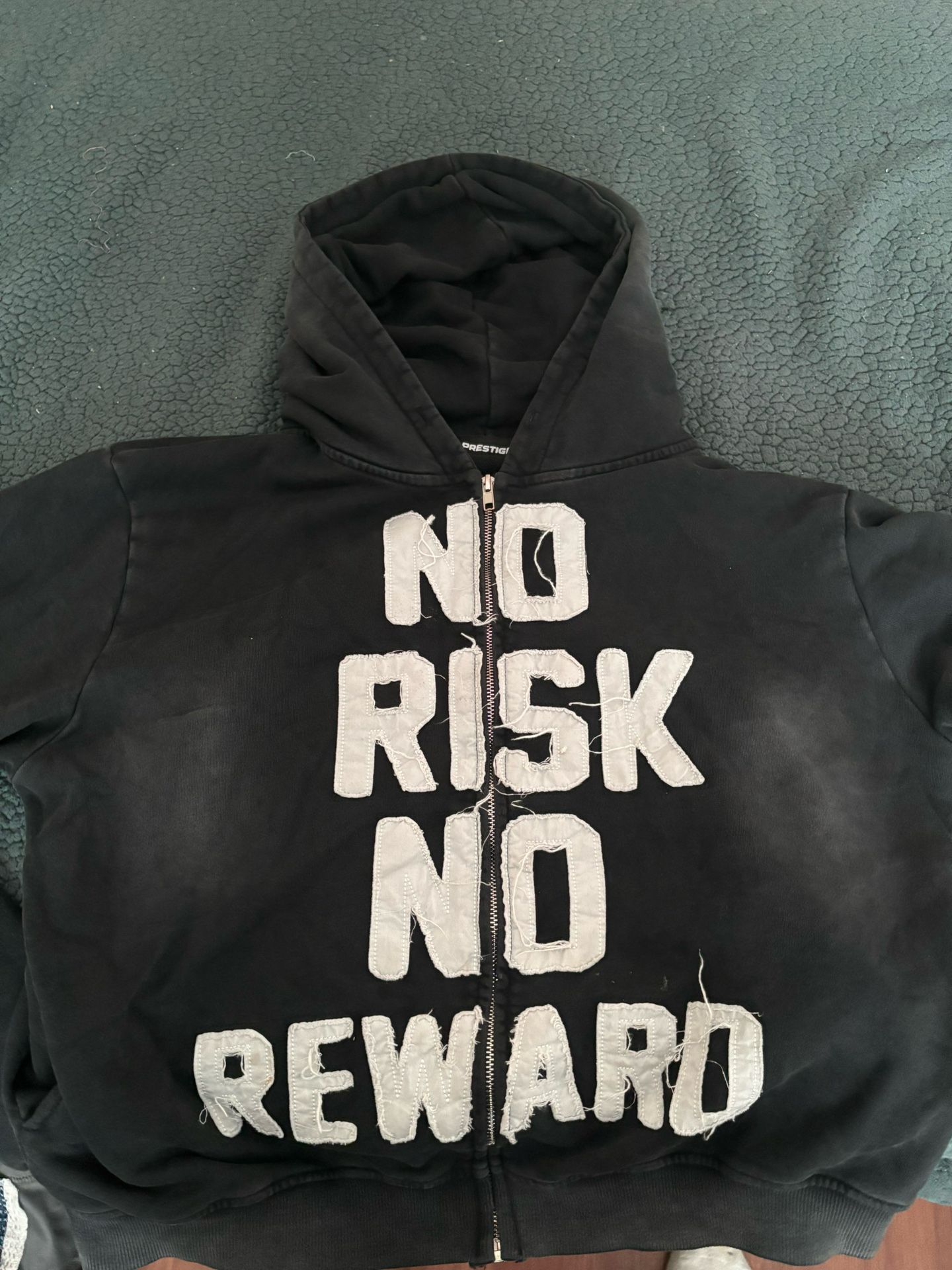 Black and white No Risk No Reward hoodie