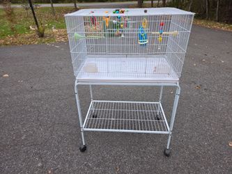 White metal bird cage with stand
