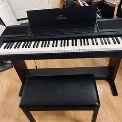 76 Key Yamaha Clavinova CV-5 with  Foot Pedals ,  Music stand, & Bench.  Has too many features to mention .  Great Instrument learn  & play on.