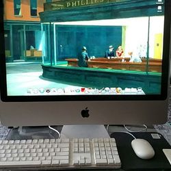 Apple All-in-one Computer. Monitor, Keyboard, Mouse, Remote. Good Condition.