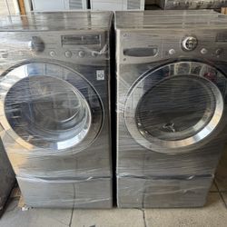 Lg Stainless Steel Washer And Dryer Set With Pedestal
