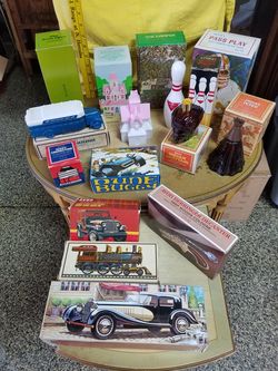 HUGE COLLECTION OF VINTAGE COLLECTIBLE AVON DECANTERS IN ORIGINAL BOXES