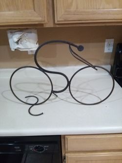 Iron bicycle rider decor