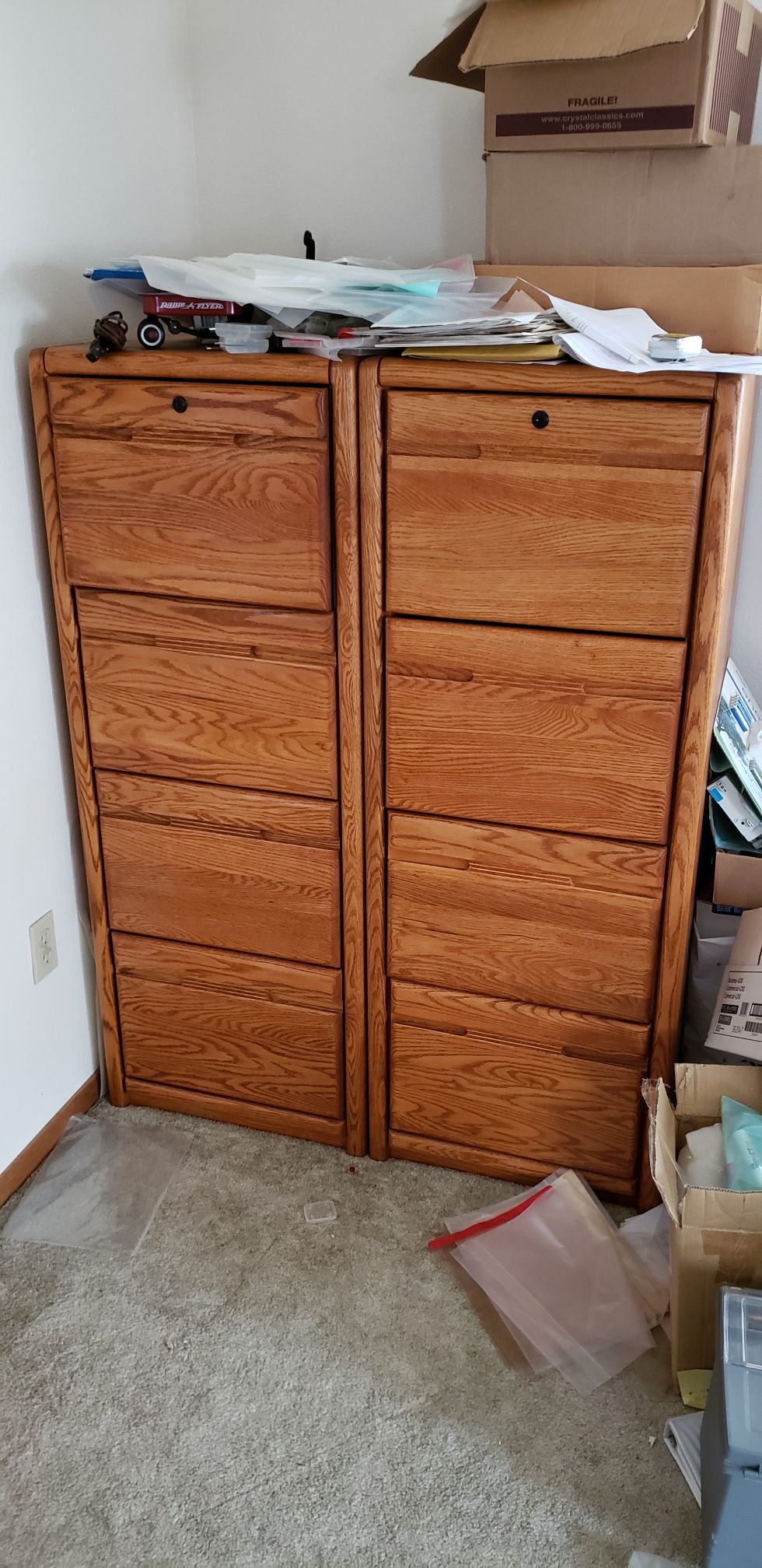 Two oak locking filing cabinets