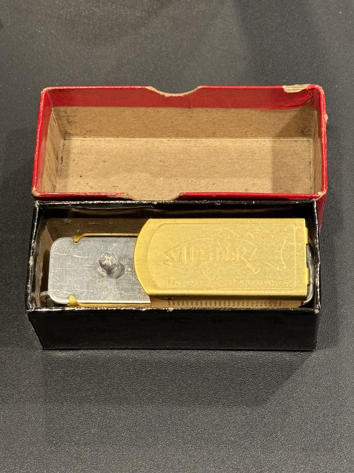 Fishing Scale By U-fibb-R Vintage etc. Original box and pamphlet. Plastic cover is cracked. Missing tape measure.