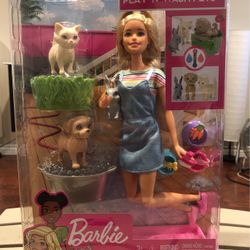 Barbies play and wash pets