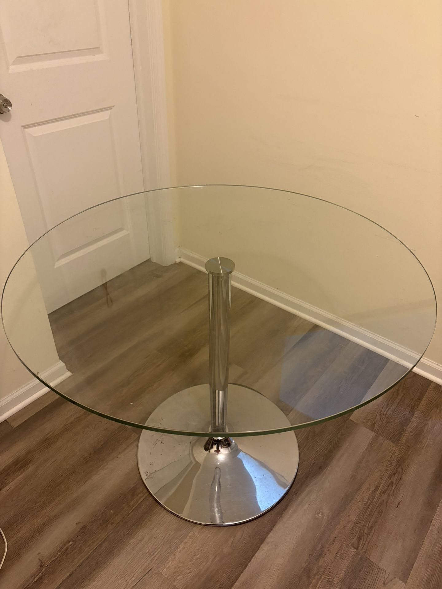 Glass table. 39 1/2in glass 28in height.