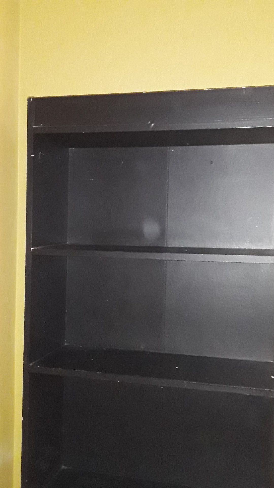 Black bookshelf.