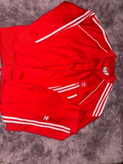 Red adidas jackets and leggings