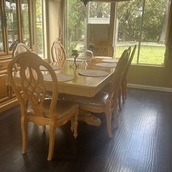 AICO Dining room table and china cabinet