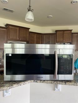 Samsung 1.6-cu ft Over the Range Microwave