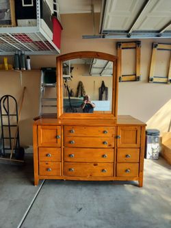 Dresser..All Wood..64 by 35 by 19 with Mirror