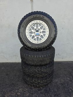 18" KMC w/ 35" Goodyear Wrangler Duratrac tires