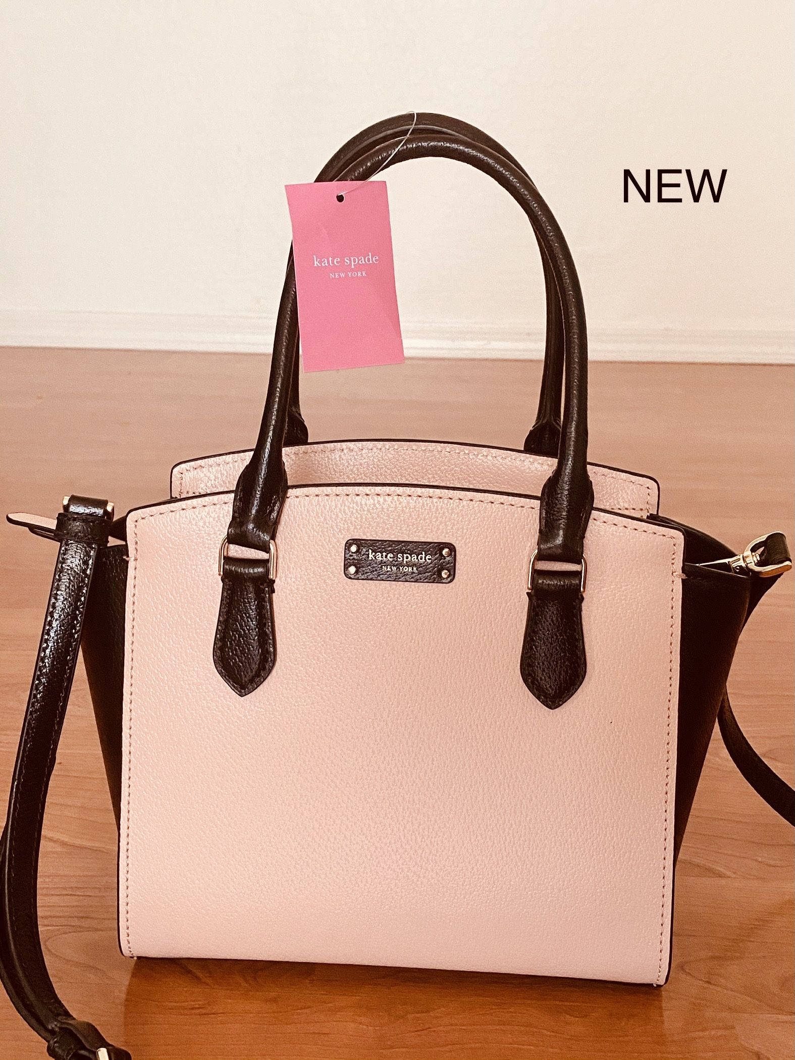 Authentic Kate Spade leather satchel, Brand New with Tags, MSRP $329, coral pink and black Kate Spade purse