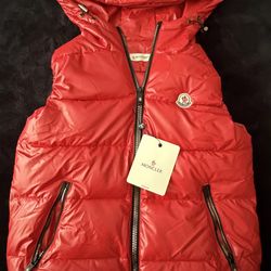Red sleeveless monclair puffer