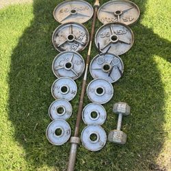 Olympic Weights With 7ft 45lb Barbell 2x45, 2x35, 2x25, 2x10 And 4x5 Lbs Also Includes 1 Single 25 Lb Dumbbell $220 