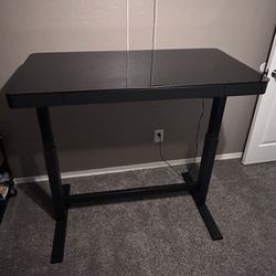 Glass standing desk